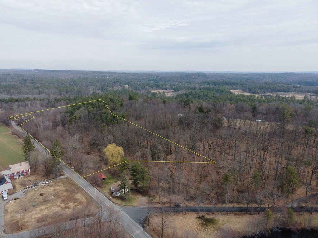 801 Lancaster Avenue Lunenburg, MA 01462 - Photo 1 of 3 a view of a yard with large trees