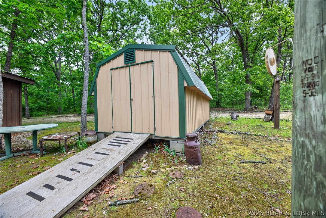 16376 Twisted Tree Road Barnett, MO 65011 - Photo 31 of 65 Shed with sky lights