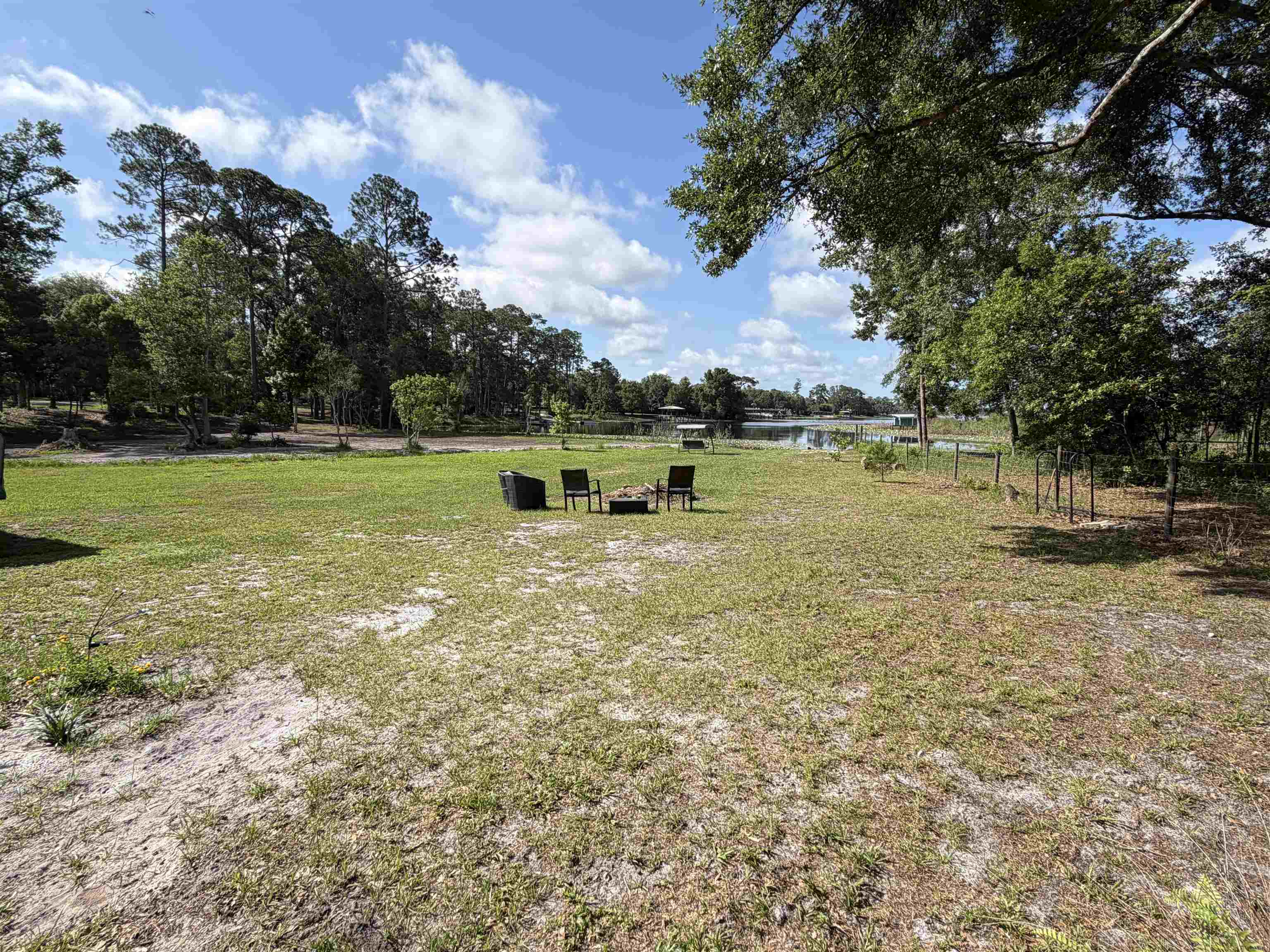 323 Sisco Road Pomona Park, FL 32181 - Photo 13 of 31 a view of outdoor space with garden and trees