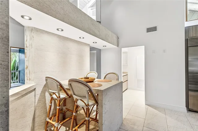 a room with two chairs and a table