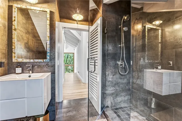 a bathroom with a sink and a mirror