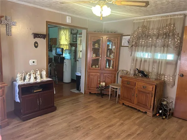 a room with furniture and wooden floor