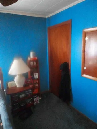 a room with furniture and a lamp