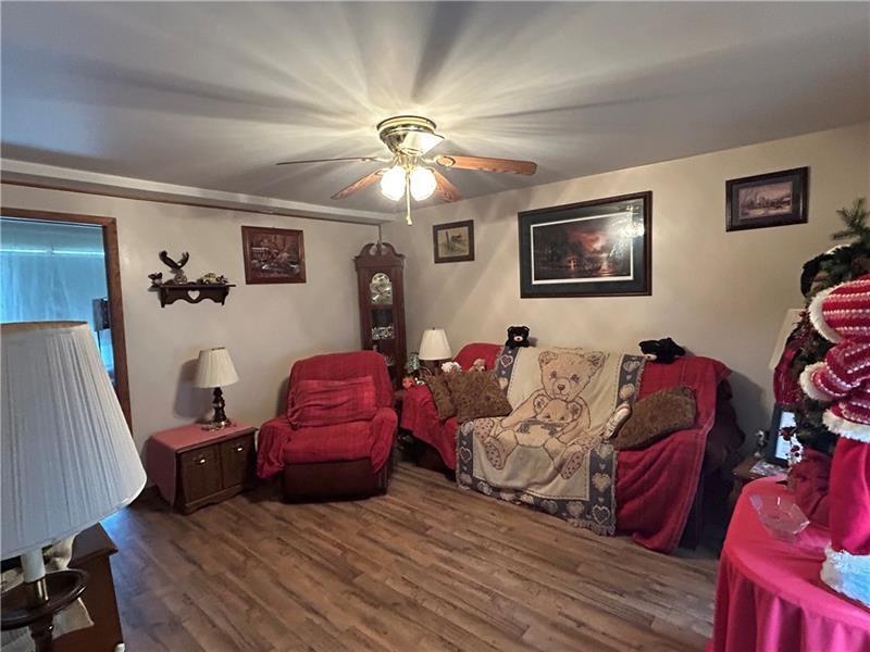 42 Walnut Avenue Dunbar, PA 15431 - Photo 8 of 31 a living room with furniture and a flat screen tv