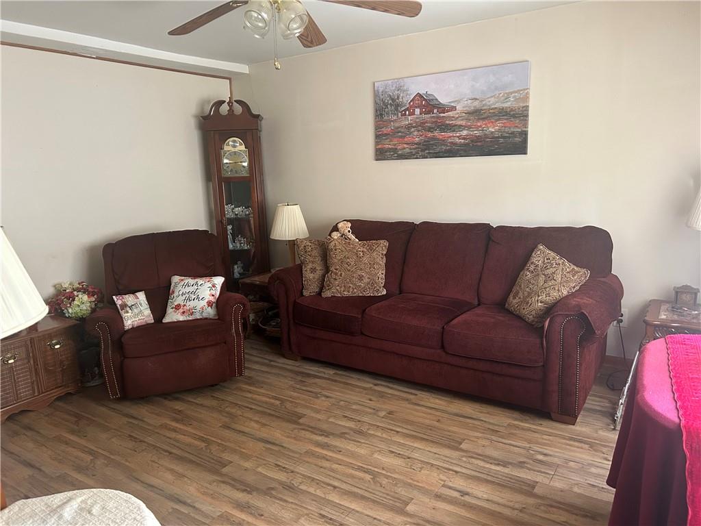 42 Walnut Avenue Dunbar, PA 15431 - Photo 9 of 31 a living room with furniture and a wooden floor