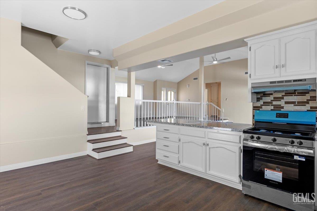 Undisclosed Address Tehachapi, CA 93561 - Photo 12 of 40 a kitchen with stainless steel appliances a stove a sink and a refrigerator