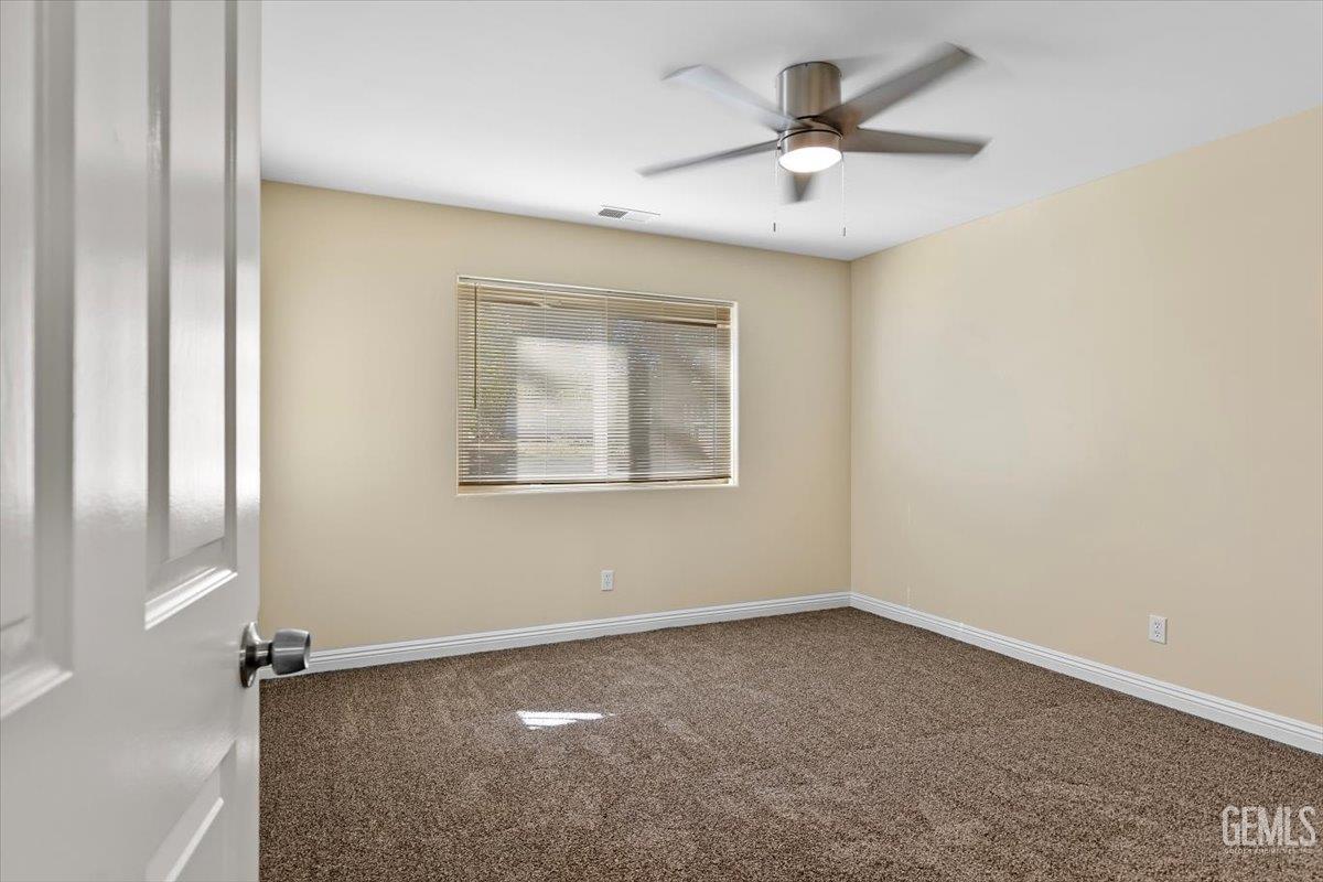 Undisclosed Address Tehachapi, CA 93561 - Photo 16 of 40 a view of an empty room with a window