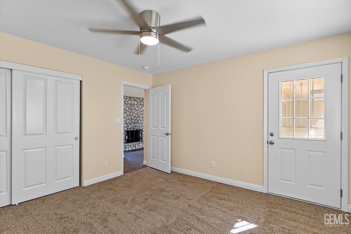 Undisclosed Address Tehachapi, CA 93561 - Photo 17 of 40 an empty room with closet and windows