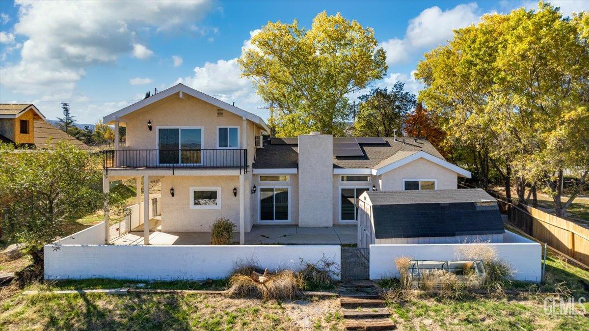 Undisclosed Address Tehachapi, CA 93561 - Photo 32 of 40 a front view of a house with a yard