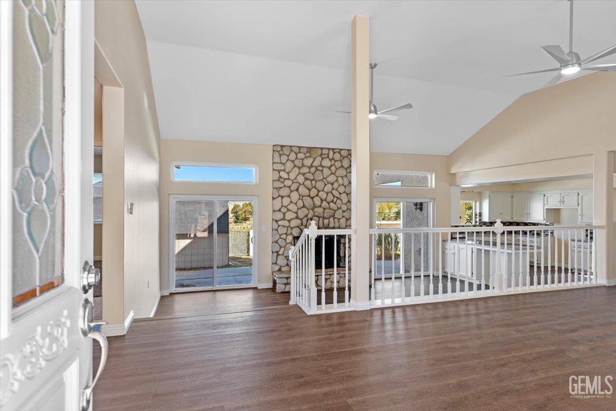 Undisclosed Address Tehachapi, CA 93561 - Photo 5 of 40 a view of a hallway with wooden floor and entryway
