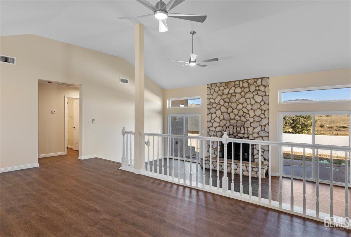 Undisclosed Address Tehachapi, CA 93561 - Photo 8 of 40 wooden floor in an empty room with a window