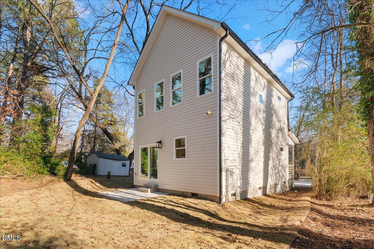 1917 Essex Road, Unit A Durham, NC 27704 - Photo 26 of 26 a view of a house with a yard