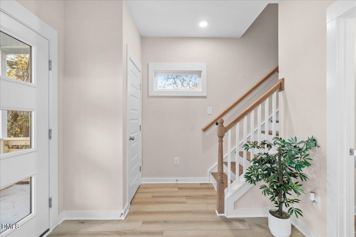 1917 Essex Road, Unit A Durham, NC 27704 - Photo 5 of 26 a view of entryway with stairs