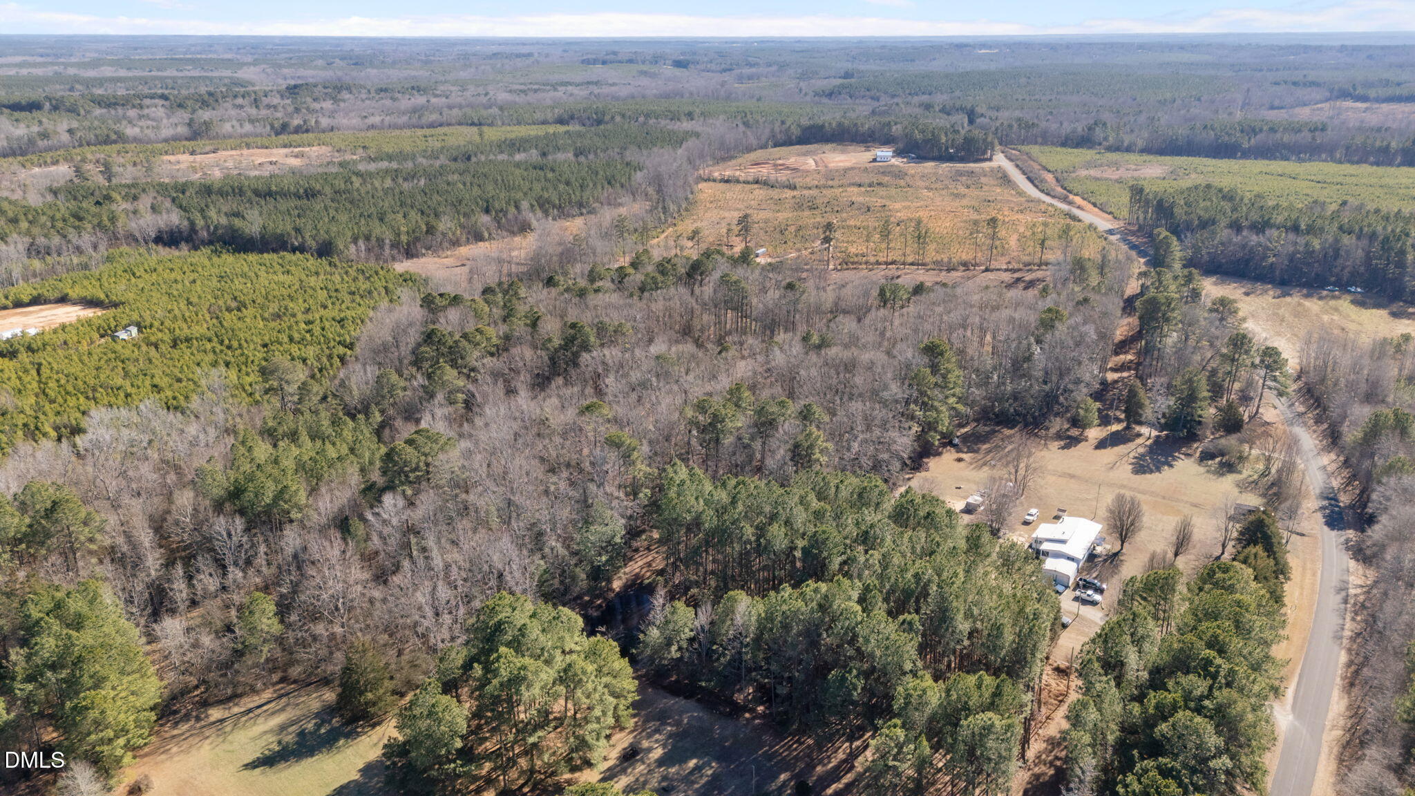 147 Charles Brown Road Warrenton, NC 27589 - Photo 9 of 18 a view of a houses with a yard and mountain