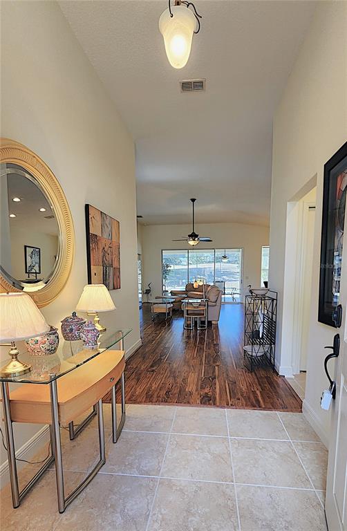 1636 West Caroline Path Lecanto, FL 34461 - Photo 12 of 85 a living room with furniture and a flat screen tv