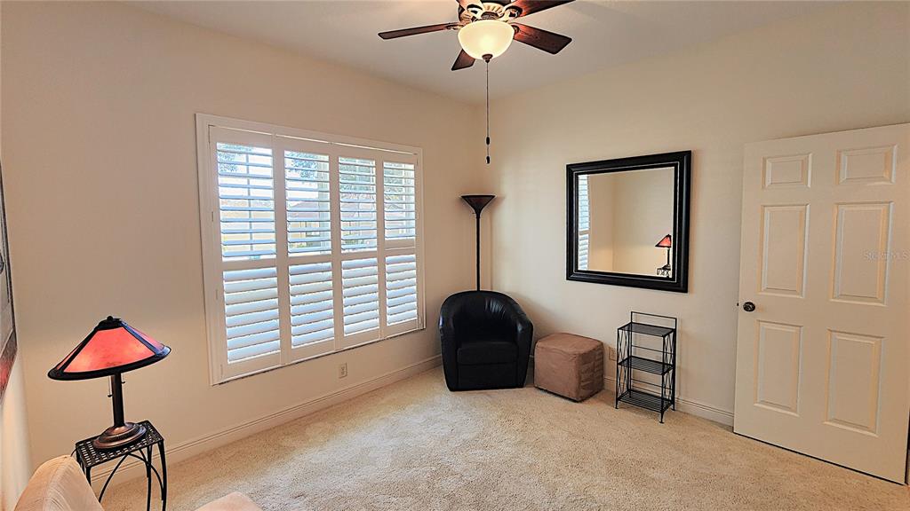 1636 West Caroline Path Lecanto, FL 34461 - Photo 17 of 85 a bedroom with furniture and a window