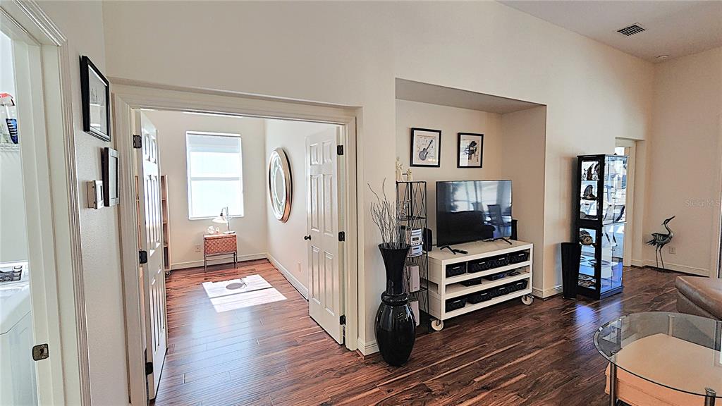 1636 West Caroline Path Lecanto, FL 34461 - Photo 32 of 85 a view of a livingroom with furniture and wooden floor