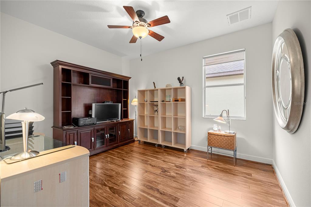 1636 West Caroline Path Lecanto, FL 34461 - Photo 33 of 85 a living room with furniture and a flat screen tv