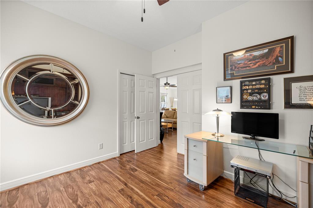 1636 West Caroline Path Lecanto, FL 34461 - Photo 34 of 85 a view of a workspace with furniture and a flat screen tv