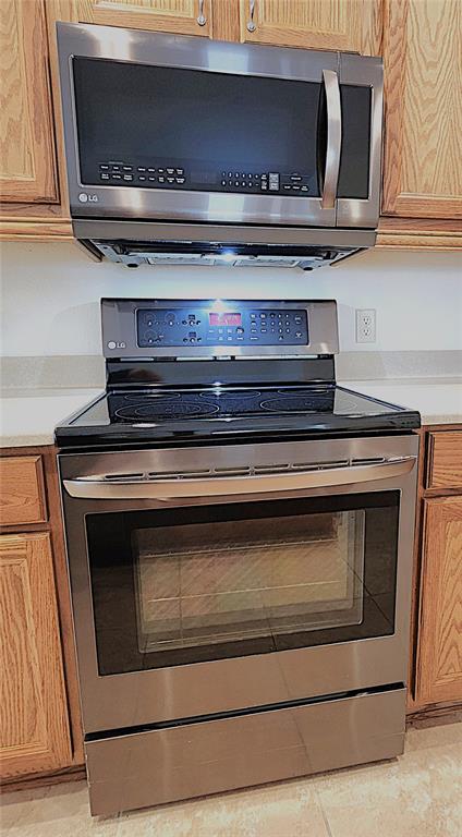 1636 West Caroline Path Lecanto, FL 34461 - Photo 45 of 85 a stove top oven sitting inside of a kitchen