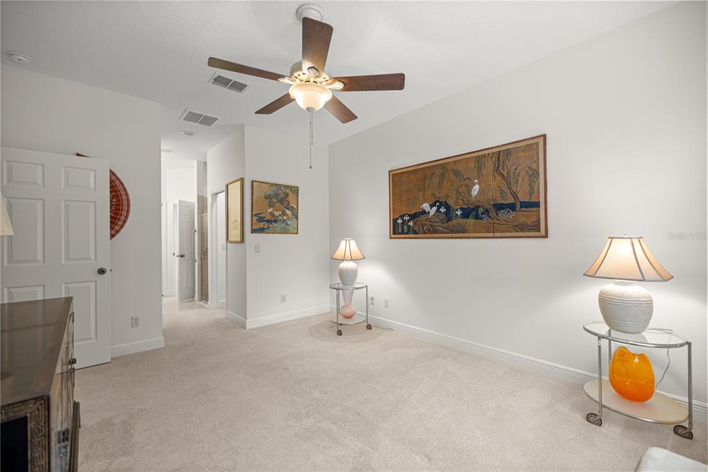 1636 West Caroline Path Lecanto, FL 34461 - Photo 53 of 85 a living room with furniture and a chandelier