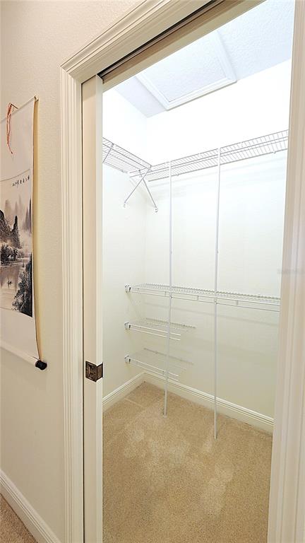 1636 West Caroline Path Lecanto, FL 34461 - Photo 61 of 85 a bathroom with a glass shower door