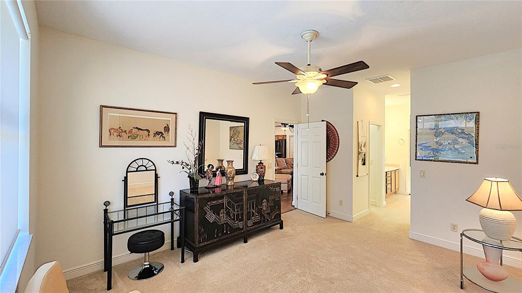 1636 West Caroline Path Lecanto, FL 34461 - Photo 63 of 85 a view of a workspace with furniture and a ceiling fan