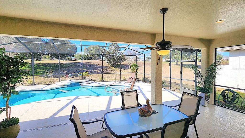 1636 West Caroline Path Lecanto, FL 34461 - Photo 69 of 85 a view of a dining room with furniture window and outside view