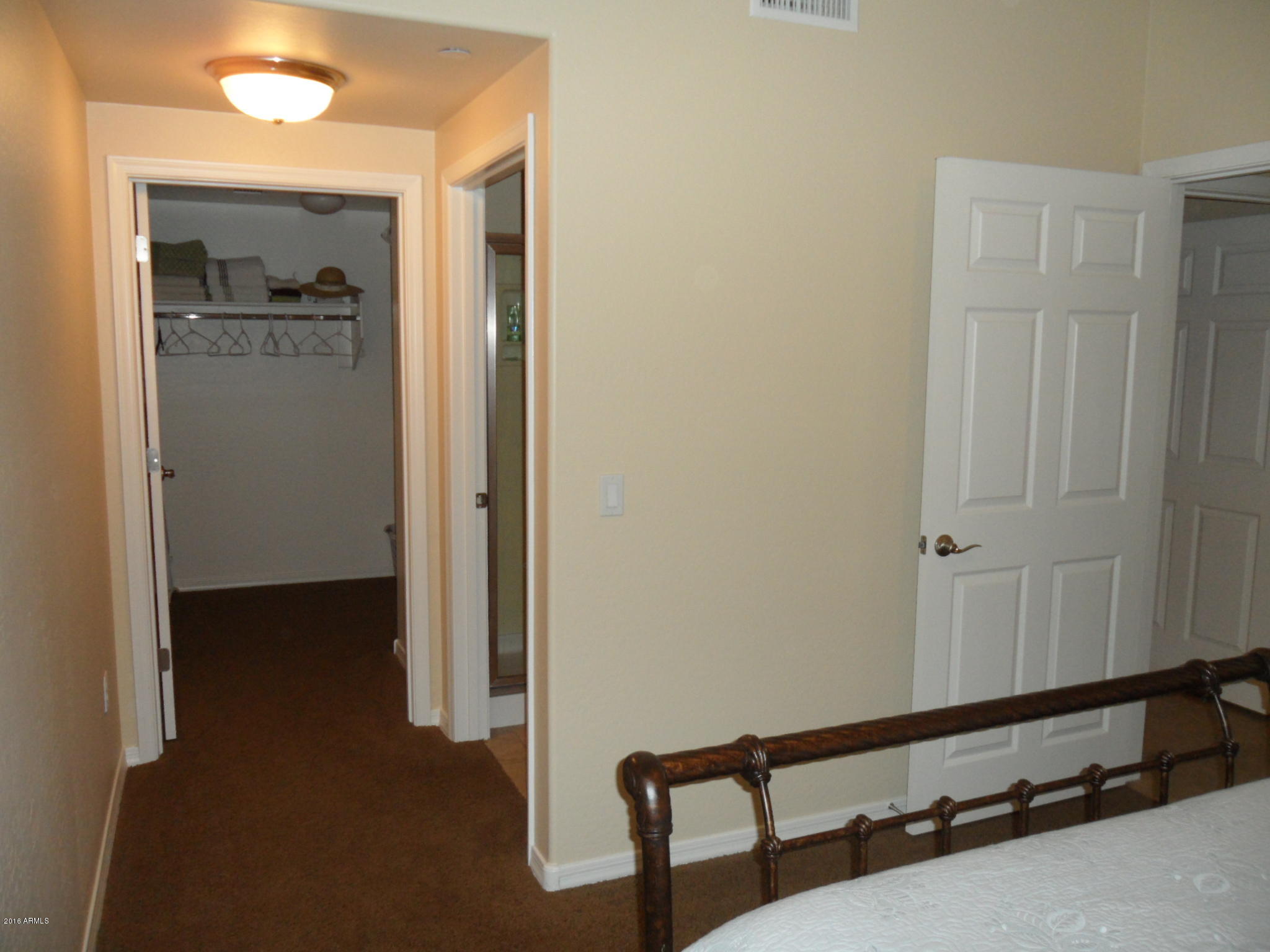 3330 South Gilbert Road, Unit 1015 Chandler, AZ 85286 - Photo 15 of 30 a view of a room with wooden floor