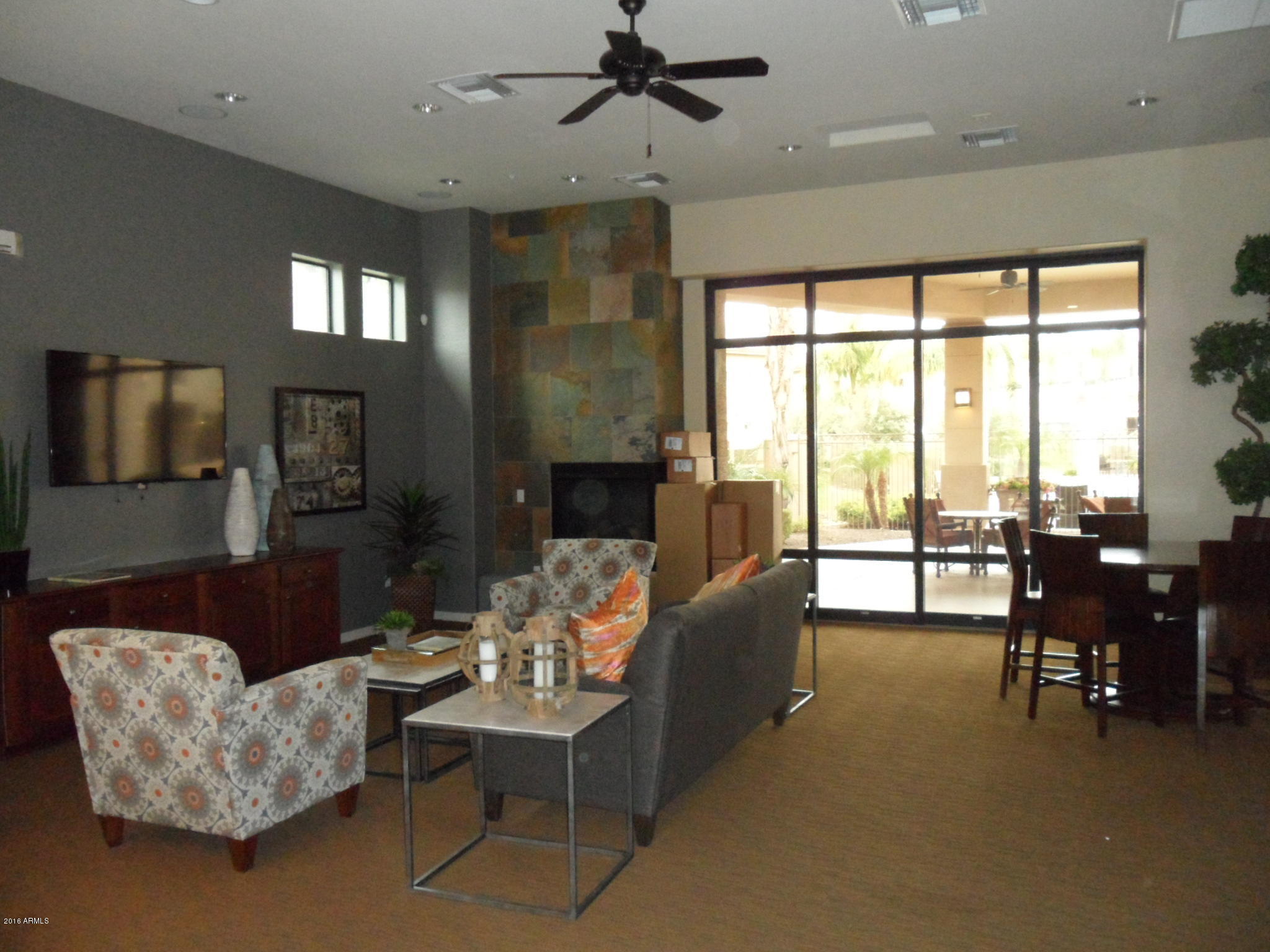 3330 South Gilbert Road, Unit 1015 Chandler, AZ 85286 - Photo 26 of 30 a living room with furniture and a large window