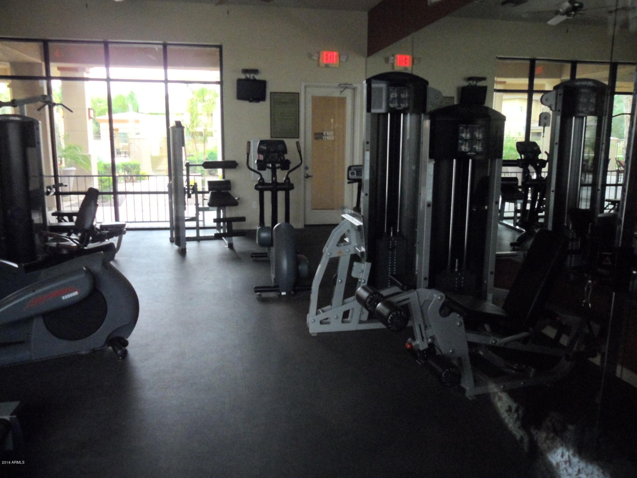 3330 South Gilbert Road, Unit 1015 Chandler, AZ 85286 - Photo 28 of 30 a room with gym equipment and large window