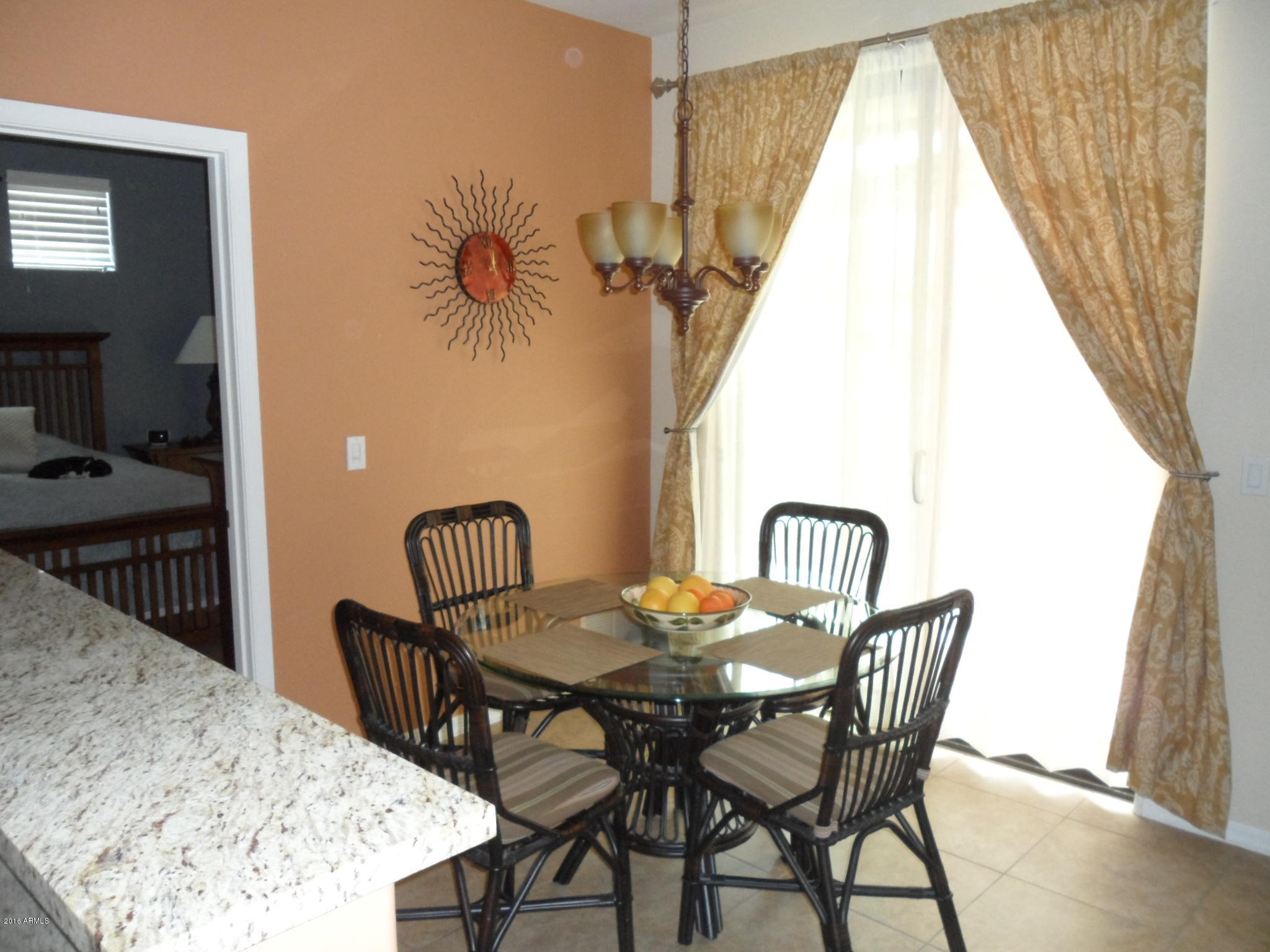 3330 South Gilbert Road, Unit 1015 Chandler, AZ 85286 - Photo 3 of 30 a view of a dining room with furniture and window