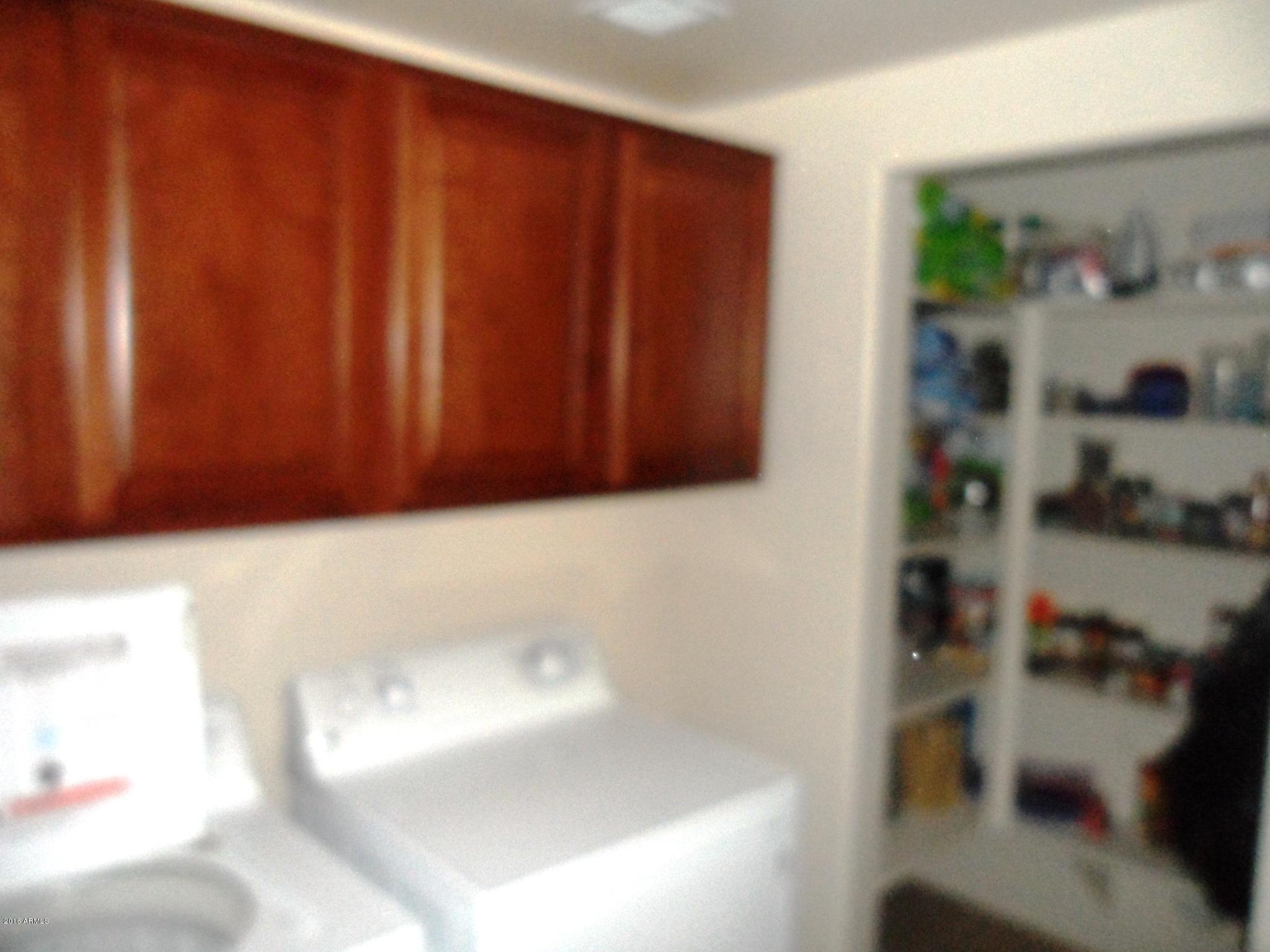 3330 South Gilbert Road, Unit 1015 Chandler, AZ 85286 - Photo 6 of 30 a view of rack