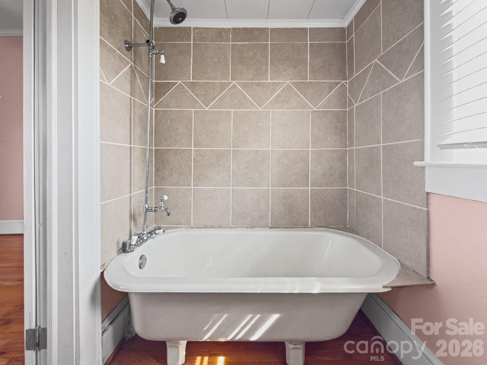 901 Mill Street Albemarle, NC 28001 - Photo 22 of 27 a bath tub sitting next to a white sink