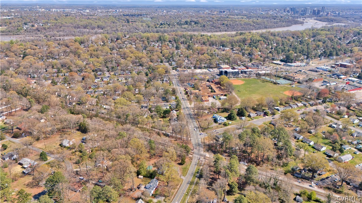5218 Jahnke Road Richmond, VA 23225 - Photo 11 of 35 an aerial view of residential houses with outdoor space and trees
