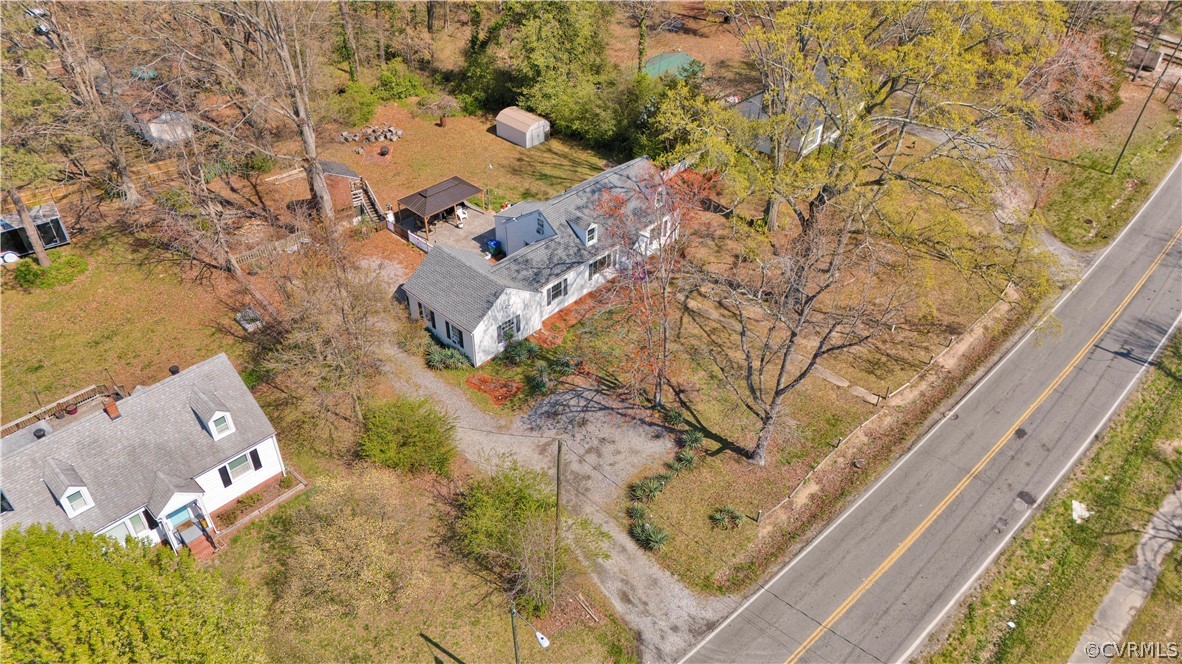 5218 Jahnke Road Richmond, VA 23225 - Photo 13 of 35 an aerial view of a house with a yard and lake view