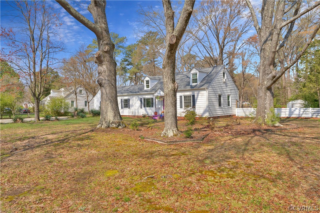 5218 Jahnke Road Richmond, VA 23225 - Photo 14 of 35 a view of road with large trees