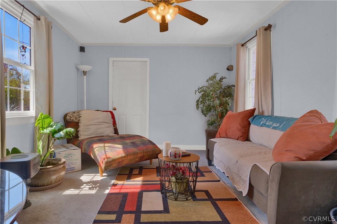 5218 Jahnke Road Richmond, VA 23225 - Photo 23 of 35 a living room with furniture and a rug