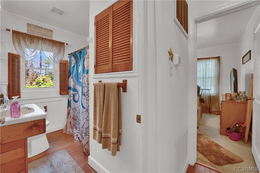 5218 Jahnke Road Richmond, VA 23225 - Photo 35 of 35 a view of walk in closet with clothes and shoes