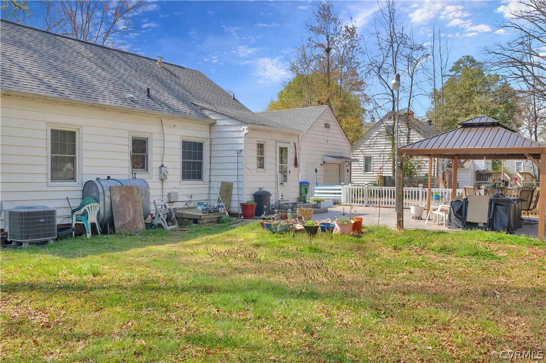 5218 Jahnke Road Richmond, VA 23225 - Photo 7 of 35 a view of a house with furniture and a yard
