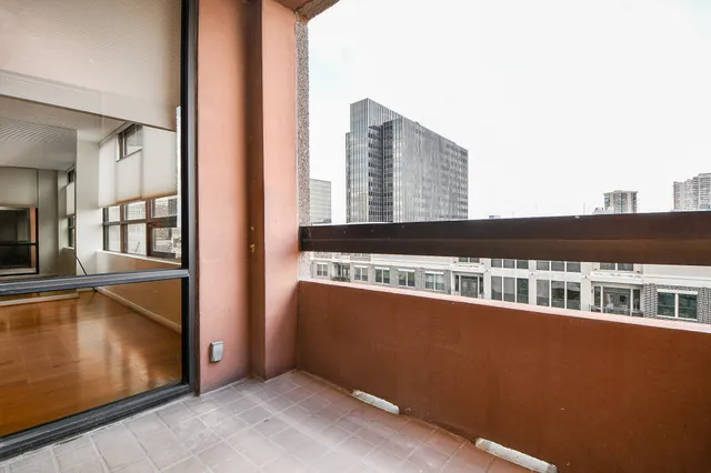 a view of a balcony with an outdoor space