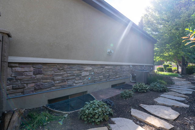 687 South 2080th Street East Springville, UT 84663 - Photo 120 of 149 Exterior featuring a stone veneer foundation, stucco siding, and a dark fascia