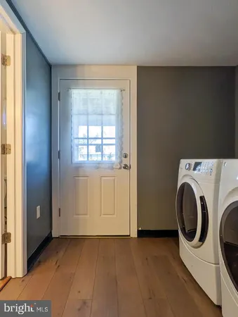 a view of a storage & utility room with washer and dryer