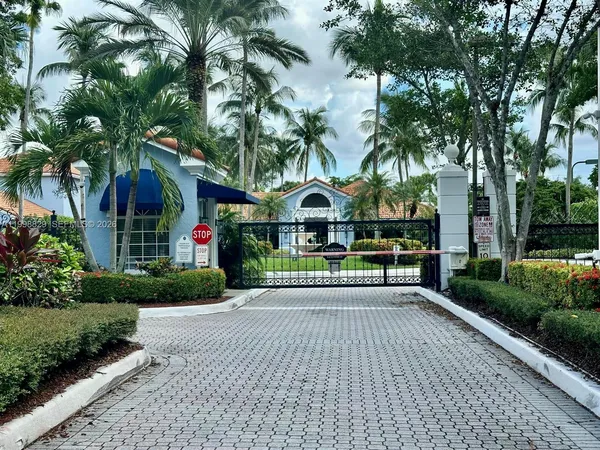 a sign board with yard in front of it