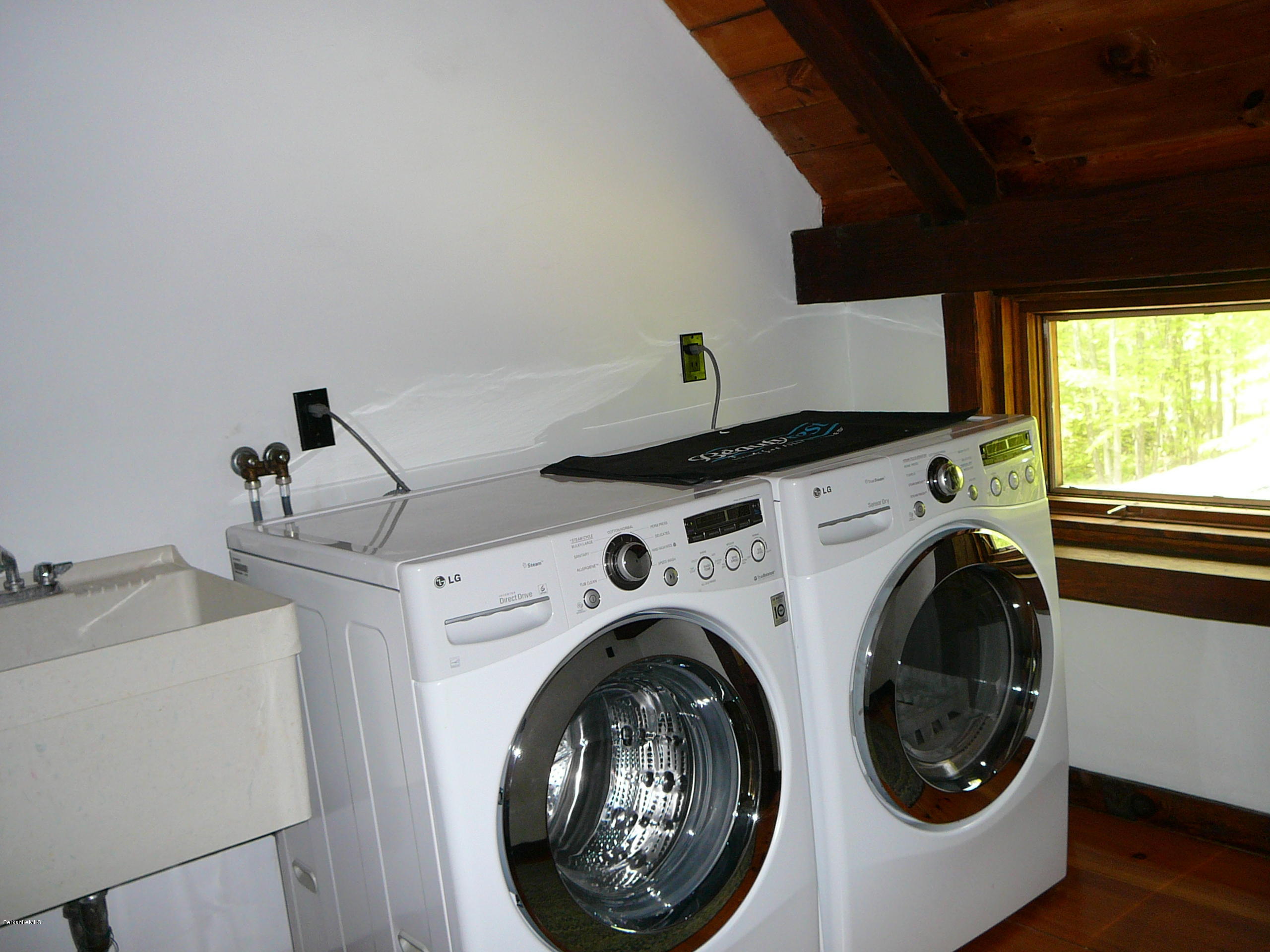 126 Tyringham Road Monterey, MA 01245 - Photo 26 of 35 a utility room with dryer and washer