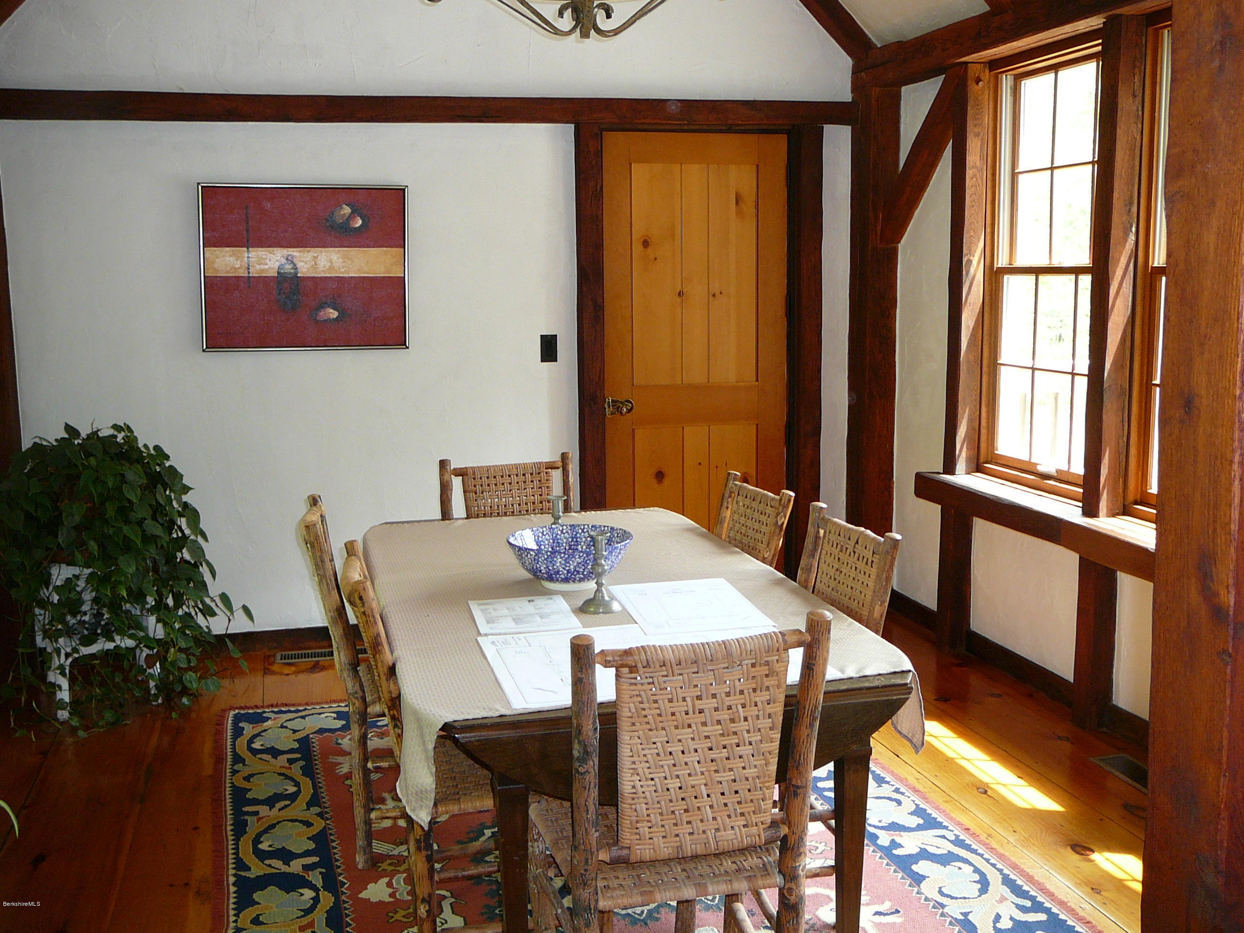 126 Tyringham Road Monterey, MA 01245 - Photo 6 of 35 a view of a dining room with furniture and window