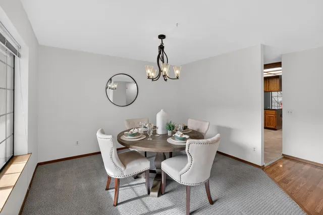 a bathroom with a granite countertop sink a large mirror and vanity