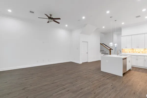 a view of kitchen and wooden floor