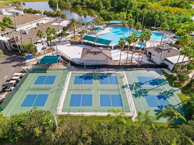 an aerial view of a house with a lake view