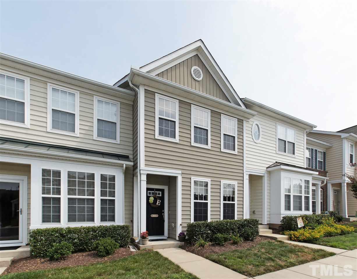 7822 Silverthread Lane Raleigh, NC 27617 - Photo 1 of 18 a front view of a house